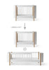 Geschwisterset für 'Wood Mini+' Babybett inkl. Junior-Erweiterung zu zwei Betten Weiß / Eiche